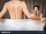 asian husband and his beautiful wife during intimacy sex on bed 